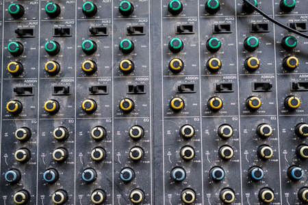 A closeup shot of mixer knobs with different colorsの写真素材