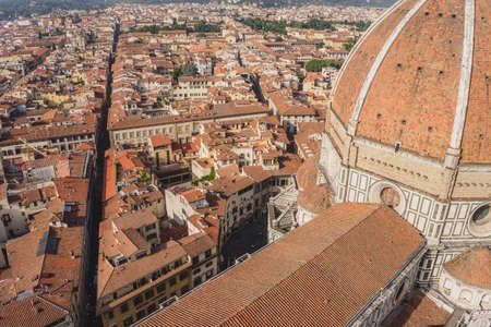 An aerial shot of buildings near the Cathedral of Santa Maria del Fiore in Italyの写真素材