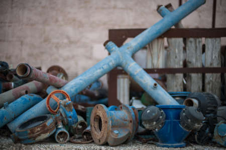 A closeup shot of old rusty industrial tubes and equipment