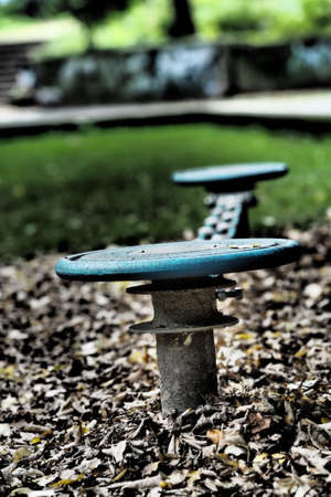 A vertical shot of a blue and black metal construction in the parkの写真素材