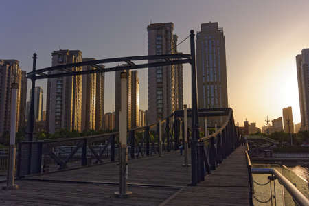 A wide angle shot of the skyscrapers of a city during daytimeの写真素材