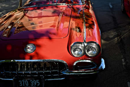 DOWNERS GROVE, UNITED STATES - Jun 07, 2019: A nice antique red car at the parking lot in Downers...