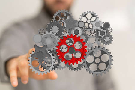 A person presenting the digital projection of engineering gearsの写真素材