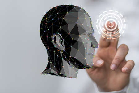 A human hand presenting a digital puzzle projection of a human head