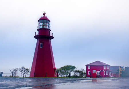 A bottom view shot of the La Martre Red Lighthouse in Canadaのeditorial素材