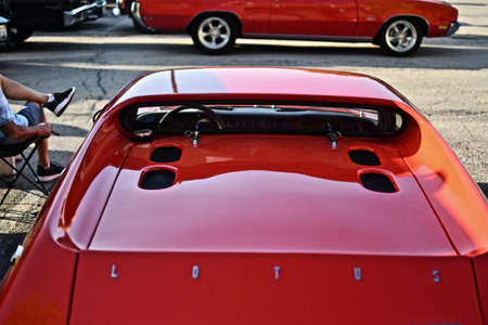 DOWNERS GROVE, UNITED STATES - Jun 07, 2019: A red Lotus Europa during Downers Grove Car Show - Friday Night Lights Downtown Car Showのeditorial素材