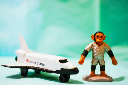 POZNAN, POLAND - Feb 06, 2019: Siku model space shuttle and a monkey figurine.