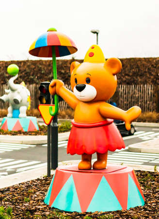 KOWNATY, POLAND - Jan 06, 2019: Brown bear figure on a cart race track in the Majaland Kownaty attraction park.のeditorial素材