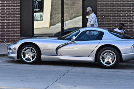 DOWNERS GROVE, UNITED STATES - Jun 07, 2019: A shiny modern car parked at the side of the street