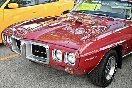DOWNERS GROVE, UNITED STATES - Jun 07, 2019: A high angle shot of a red pontiac model vintage carのeditorial素材