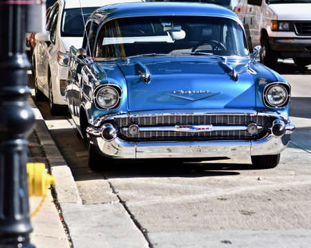 DOWNERS GROVE, UNITED STATES - Jun 07, 2019: A beautiful shot of a blue chevrolet parked at the side of the streetのeditorial素材