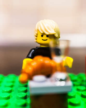 POZNAN, POLAND - Dec 02, 2019: Lego figurine concept in soft focus background.のeditorial素材
