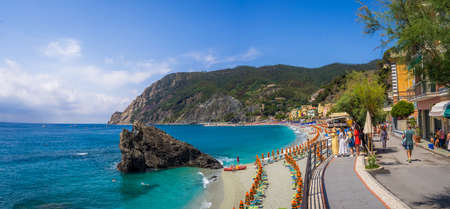 MONTEROSSO, ITALY - Jul 07, 2019: The sea and sandy beach Spiaggia di Fegina at the Cinque Terre...