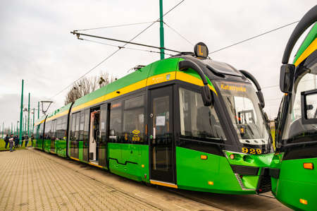 POZNAN, POLAND - Nov 24, 2019: Green modern exposition tram during the MPK Katarzynki event.のeditorial素材