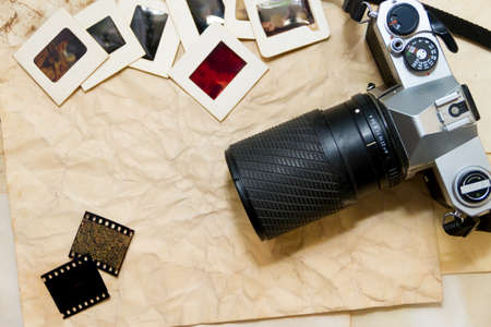 top view of an old camera with negatives and slides photographyのeditorial素材