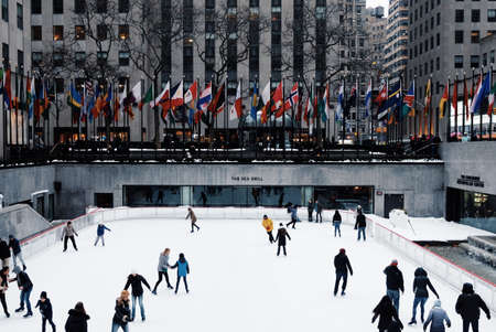 NEW YORK, UNITED STATES - Apr 04, 2017: People skating in  the rink at Rockefeller Centerのeditorial素材