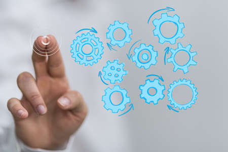 Business, Internet and technology concept. Business select gear icon on virtual screenの写真素材