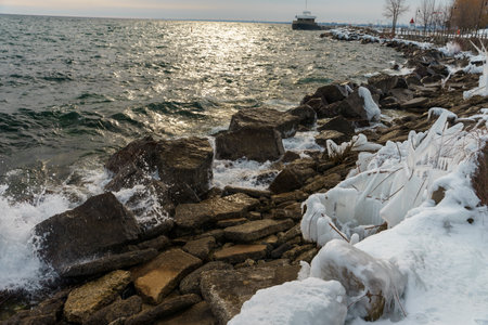A beautiful shot of sea waves hitting the rocksの写真素材