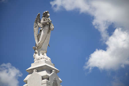 A beautiful shot of the religious statues with the blue sky in the background in New Orleansの写真素材
