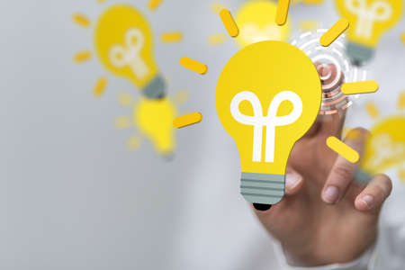 A male hand and a light bulb icon-concept of a good idea