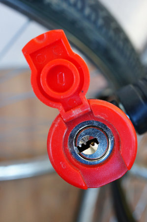 A closeup vertical shot of a red keyholeの写真素材