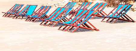 A panoramic shot of beach chairsの写真素材