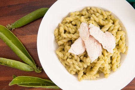 green pea pasta with grilled chickenの写真素材