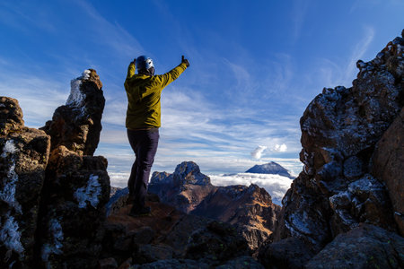 A closeup shot of a man on the volcano Popocatepetl in Mexico