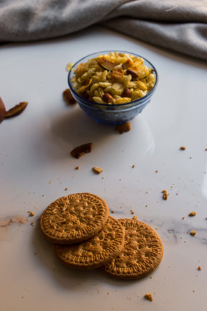 A selective focus shot of delicious Indian snack with round cookiesの写真素材