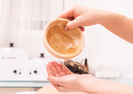 A closeup shot of a professional masseuse working in the spaの写真素材