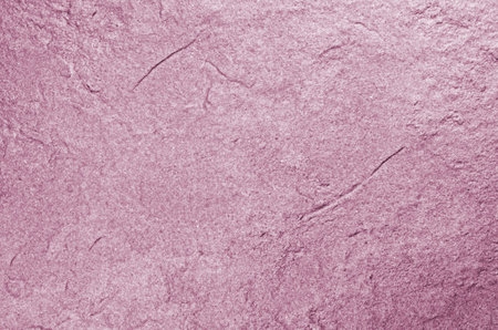 A bright-toned rough stone background - copy spaceの写真素材