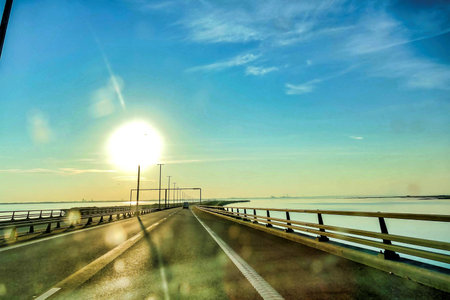 A beautiful shot of a highway under a blue skyの写真素材