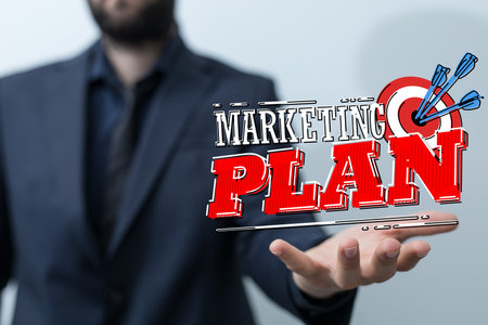 makes a dart throw on the target. The concept of persistence in business.の写真素材