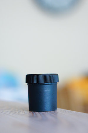 A closeup shot of black watercolor paint in a containerの写真素材