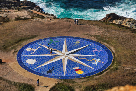 An aerial shot of Compass Rose at the Tower of Hercules in A Coruna, Galicia, Spain at daytimeの写真素材