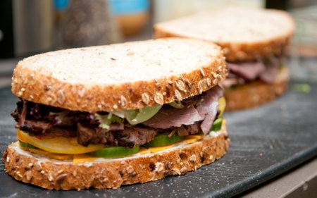 deli sliced roast beef on cracked whole wheat breadの写真素材