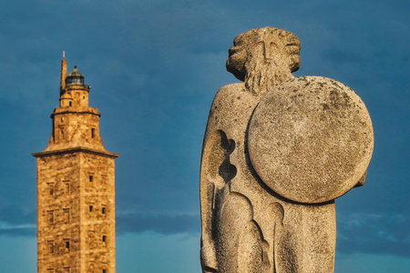 A statue next to the Tower of Hercules in Galicia, Spainの写真素材