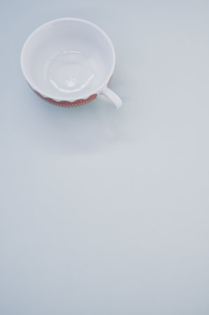 A vertical shot of cup isolated on white backgroundの写真素材