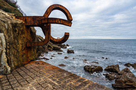 A seascape in San Sebastian withThe Wind Comb sculpture in Basque Country, Spainの写真素材
