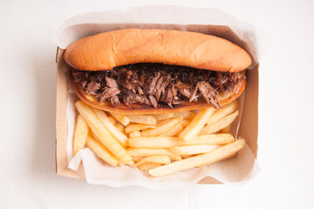 take out beef dip or french diup with friesの写真素材