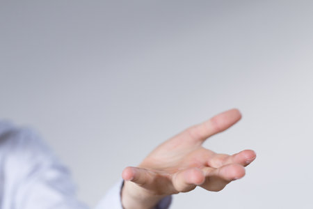 A closeup shot of the hand of a businessman at a presentationの写真素材
