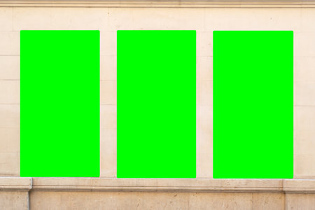 Green screen billboard or large display on nice old historical building in european mediterranean city center. Entertainment and consumerism conceptの写真素材