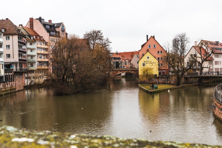 NÃ¼RNBERG, GERMANY - Feb 24, 2020: A photo of the river "Pegnitz" taken on the "Fleischbruecke" in Nurembergのeditorial素材