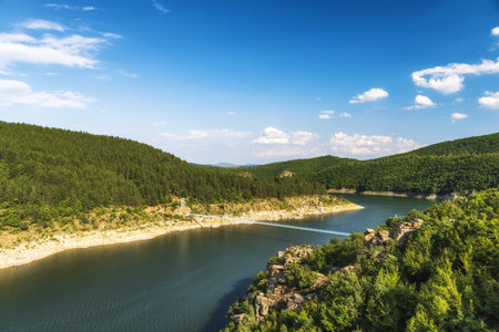 A beautiful view of the Kardzhali dam, Bulgaria during the daytimeの写真素材