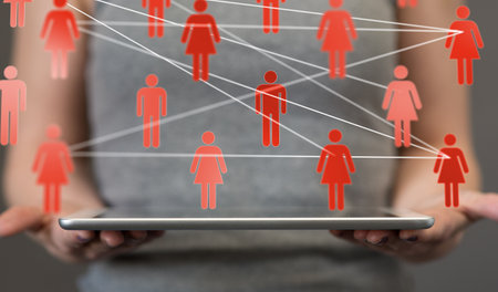 A closeup shot of a person presenting the virtual projection of social networkの写真素材