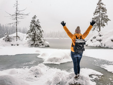 A beautiful shot of a girl enjoying a winter day