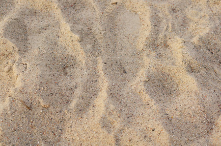 A top view shot of white sand on the beach