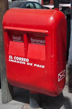A red metal mailbox in Mexico for postcards and letters.のeditorial素材