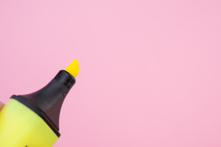 A yellow marker isolated on a bright backgroundの写真素材
