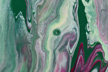 A closeup shot of abstract patterns of colorful acrylic paints in the water